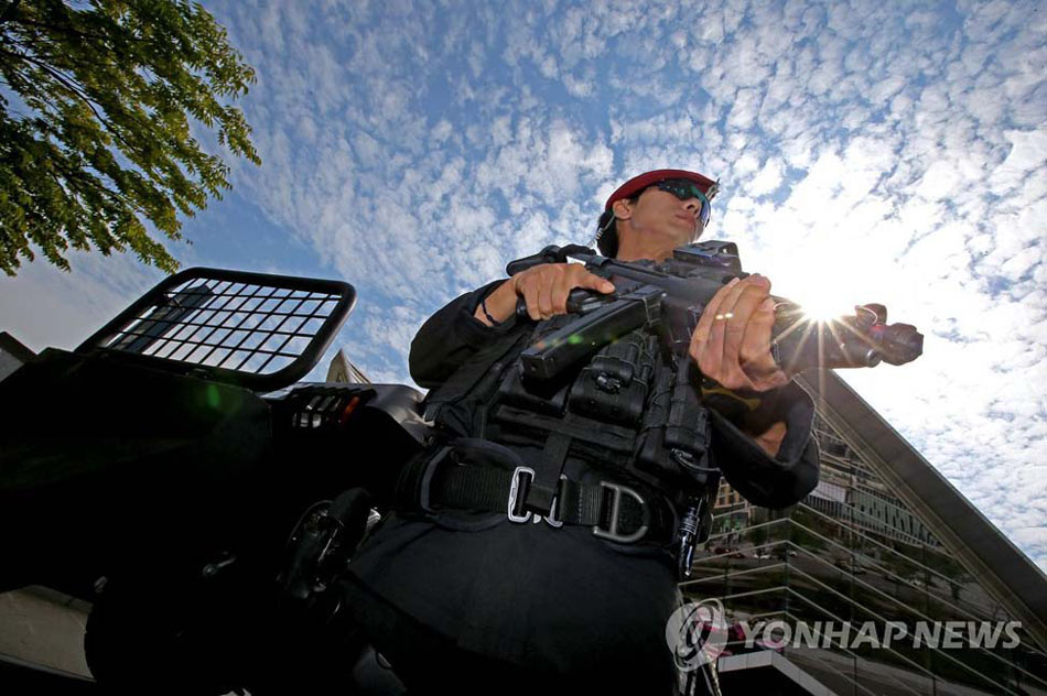 한국 특공대 장갑차 출동해 아시아경기대회 안전 보장